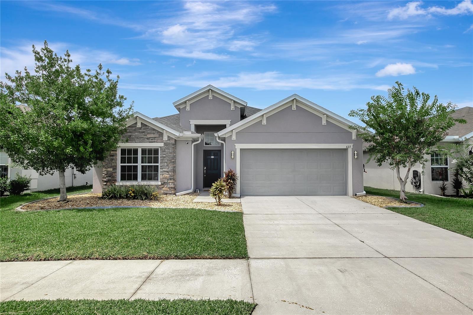 Welcome to this beautifully upgraded 4-bedroom, 2-bath, 2-car garage home located in the sought-after Villages of Avalon. This move-in ready gem boasts luxury vinyl flooring throughout the bedrooms and a stylish paver patio—perfect for outdoor entertaining. Enjoy privacy and tranquility in the fully fenced backyard with serene views, creating a peaceful retreat right at home.
Inside, you’ll find a host of premium builder upgrades, including granite countertops in both the kitchen and primary bath, extended 42" upper cabinets, and upgraded 17x17 tile flooring throughout the main living areas. The spacious primary suite features a luxurious walk-in shower, while energy-efficient features like double-pane vinyl windows and a 16 SEER variable speed A/C unit provide comfort and long-term savings.
Relax year-round in the screened lanai or entertain guests in your beautifully designed backyard oasis. The Villages of Avalon offers a low HOA, NO CDD fees, and an unbeatable location just 2 miles from the Suncoast Parkway and only 30 minutes to Citrus Park Mall—offering the perfect blend of convenience, comfort, and value.
Don't miss the opportunity to own this exceptional home with thoughtful upgrades and a truly welcoming atmosphere!