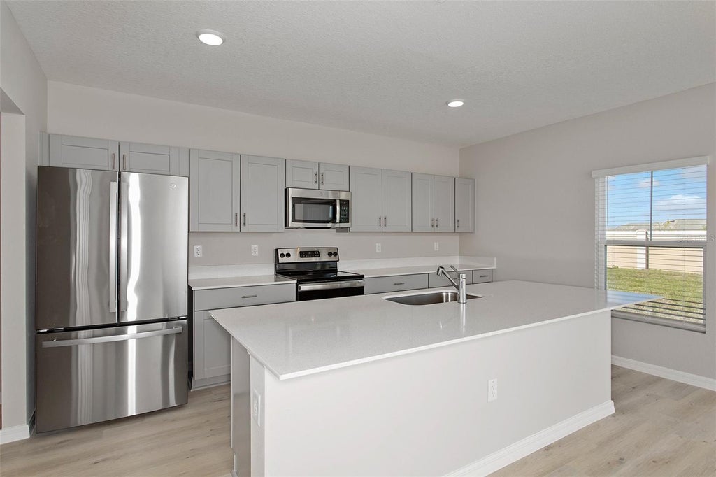Photo of 36675 Thornhedge Drive, Zephyrhills, FL 33541 (MLS # TB8545764)