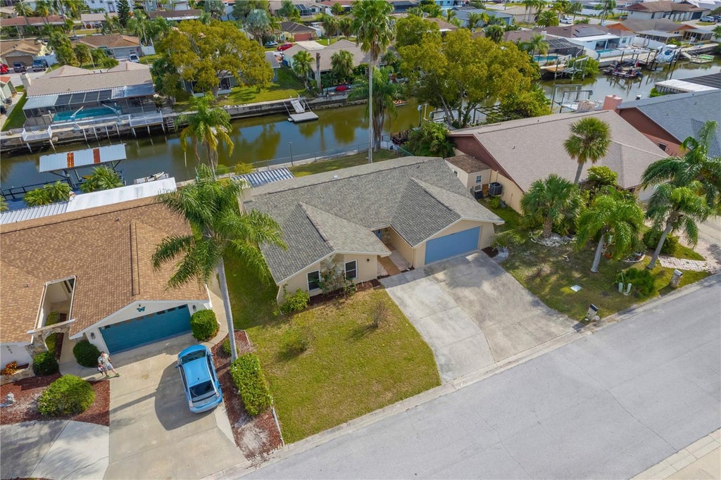 Photo of 9840 San Sebastian Way, Port Richey, FL 34668 (MLS # O6447207)