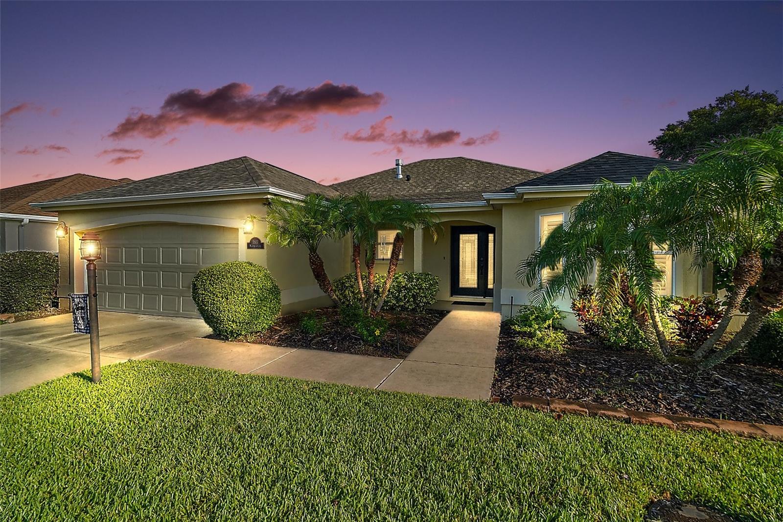 TURNKEY, CUSTOM, UNIQUE, COMPLETELY REMODELED Vera Cruz Designer on a PRIVATE PRESERVE, BOND PAID, NEW HVAC, 2025 ROOF, NEW WATER HEATER, and SOLAR SYSTEM! NEWER LANDSCAPING front and rear; lovely LEADED GLASS front door with sidelite and covered porch, offers an inviting entrance. LOVELY WIDE PLANK, WOOD-LOOK tile flooring throughout excluding the bedrooms. An AMAZING redesigned kitchen with GRANITE countertops, MOSAIC TILE backsplash, under cabinet lighting, STAINLESS appliances, including GAS built-in stove, LARGE ISLAND featuring a sink, with electrical and more cabinets for storage, and a CASUAL DINING area with large bay window. The living room was remodeled to include a built-in WINE bar with a NEW wine refrigerator, GRANITE countertops, glass backsplash and under cabinet lighting. The living room has been enhanced with a built-in GAS burning fireplace, TV, and additional nooks and trim for, not only functionality, but an impressive feature to this lovely home. You’ll really enjoy the PRIVACY that this home provides with the PRESERVE VIEW. Sliding glass doors open from the living room out to the screened lanai with custom tile flooring – a great place to enjoy the peacefulness this VIEW provides. Other features include CROWN MOLDING and PLANTATION SHUTTERS throughout the home! The primary bedroom also has sliding glass doors that also open to the lanai and PRIVATE VIEW, and a remodeled EN-SUITE bath. This lovely bath has dual sinks, GRANITE countertops, and a spacious TILED shower with a FRAMELESS GLASS door and a huge WALK-IN closet with BUILT-INS! The 2 guest rooms have carpet; one is being used for an office/den. The guest bath was completely remodeled with the same attention to detail as the primary bath! Even the laundry room has a HALF BATH, washer and dryer and lots of extra cabinet space. Other enhancements include a NEW Kinetic WATER FILTRATION system, an oversized, expanded 2 car garage, and don’t forget the added SOLAR SYSTEM that will keep those electricity bills much lower! THIS IS A BEAUTIFUL HOME WITH A GREAT LOCATION AND PRIVATE VIEW! Right around the corner from the Hacienda Hills Country Club and a short distance to Spanish Springs for all your shopping, dining, and entertainment! COME SEE THIS ONE OF A KIND, VERY SPECIAL HOME!