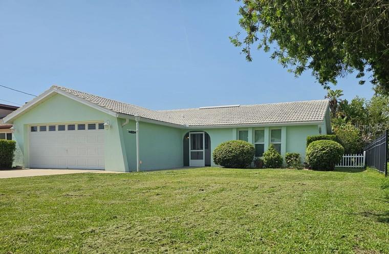 When your backyard is the Gulf you can enjoy beautiful sunsets every night. Or wake up and walk directly out to your private floating dock.This home is on a wide salt water canal in Sea Pines. The backyard features a beautiful manicured lawn and landscaping with concrete patio, sea wall, floating dock and 5000 pound boat lift. Once inside the home you will discover a spacious open floor plan with low maintenance tile flooring, vaulted ceilings, a wood burning fire place in the family room. This 3 bedroom, 2 bath home has been completely remodeled with top notch stainless steel appliances, granite countertop , double sink, garbage disposal. This gourmet kitchen is a cooks dream with plenty cabinet space, and a breakfast nook. The master bedroom has French doors leading to the Florida Room , a cedar lined walk in closet and full ensuite bath. This home is turn key and stylish. Classic Florida features backyard views, in unit laundry, attached 2 car garage, central heat and air, screened lanai, utility shed. . Just minutes from local dining, beaches, boating, and everything else on the West coast .Just perfect for your Gulf adventures.