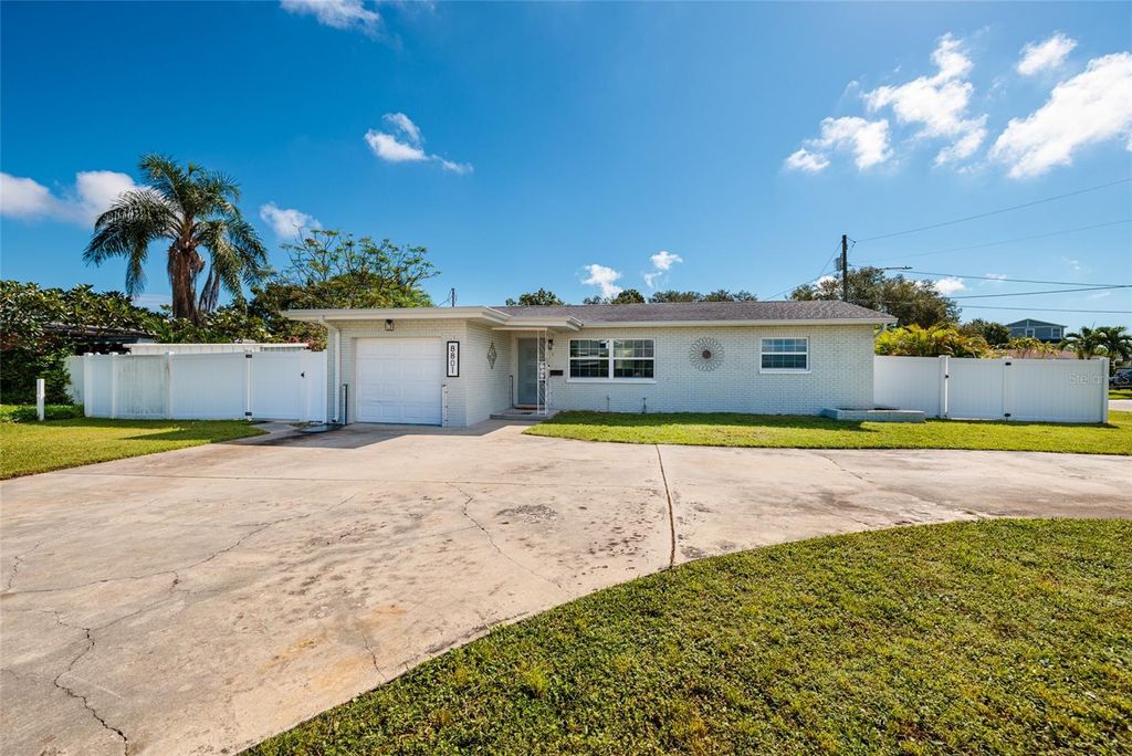 Photo of 8801 Sunlit Cove Drive NE, St Petersburg, FL 33702 (MLS # TB8433466)