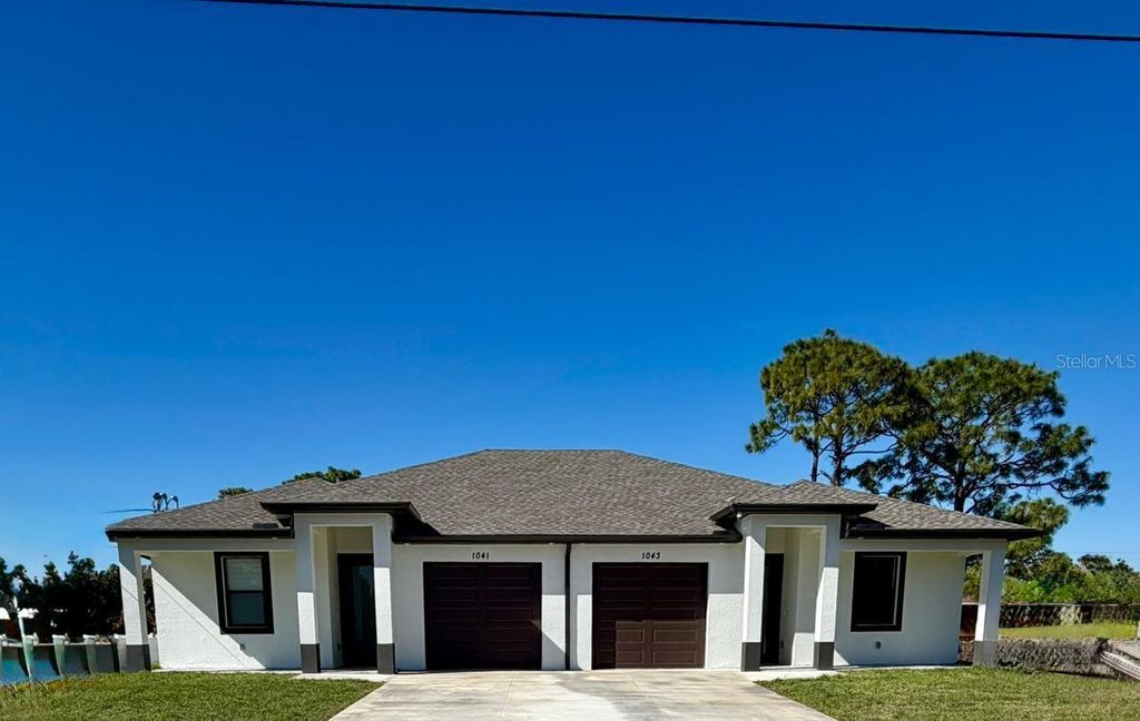 Photo of 1043 Albany Avenue, Lehigh Acres, FL 33971 (MLS # O6366195)