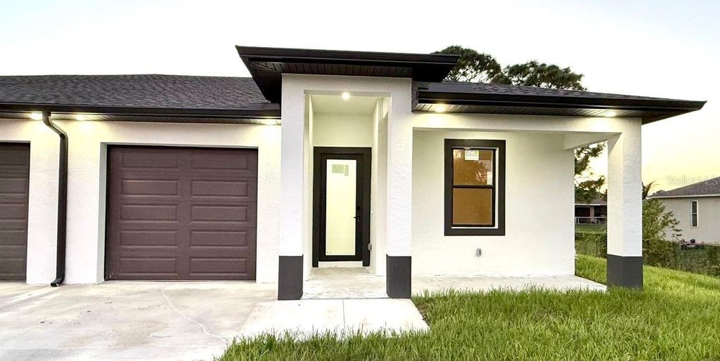 Photo of 1043 Albany Avenue, Lehigh Acres, FL 33971 (MLS # O6366195)