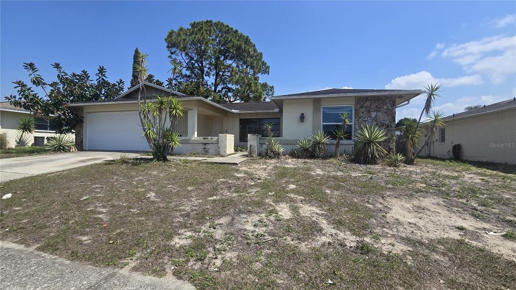 Photo of 8022 Idle Briar Lane, Port Richey, FL 34668 (MLS # TB8490581)