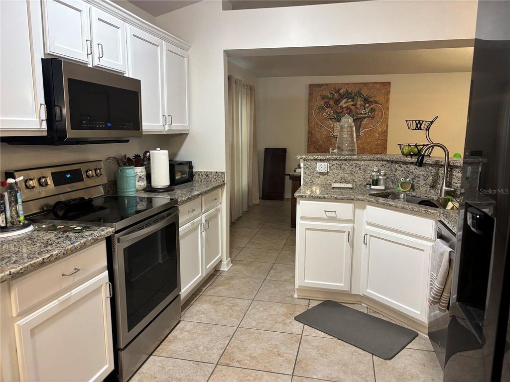 Photo of 304 Marion Oaks Trail, Ocala, FL 34473 (MLS # OM728987)
