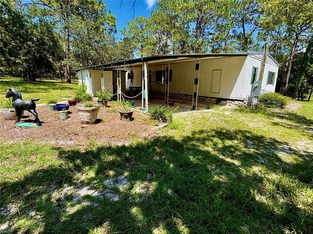 Photo of 10780 S Flutter Terrace, Inverness, FL 34452 (MLS # OM729360)