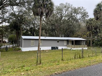 Tiny photo for 7032 SE 170th Avenue Road, Ocklawaha, FL 32179 (MLS # O6421079)