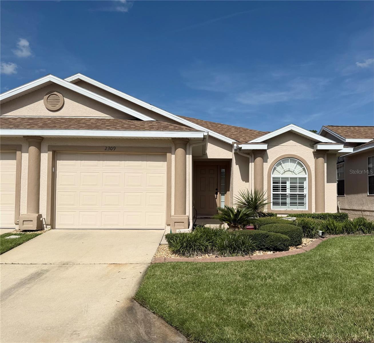 Nestled in the beautifully maintained Woodland Villages community, this stunning villa offers the perfect blend of comfort, natural beauty, and resort-style living. Step inside to discover the soaring high ceilings, expansive windows that flood the interior with natural light, and a bonus room that is ideal for an office/den. The thoughtfully designed floor plan features a spacious kitchen with a breakfast bar, casual dining space, and built-in cabinetry for extra storage. Both generously sized bedrooms provide direct access to the screened back lanai overlooking pond and amenities. The primary bedroom boasts a luxurious bathroom with a large soaking tub, walk-in shower, and dual sinks. Residents get to enjoy access to exceptional community amenities, including a pavilion, clubhouse, sidewalks, pool, and a tennis/pickleball court. The HOA provides a maintenance-free lifestyle, covering extensive services such as landscaping, irrigation, exterior painting, pest and termite control, and more. Located just minutes from schools, shopping centers, medical facilities, dining, and major conveniences, this villa offers the ideal combination of privacy, comfort, and accessibility. Don’t miss the opportunity to see this one!