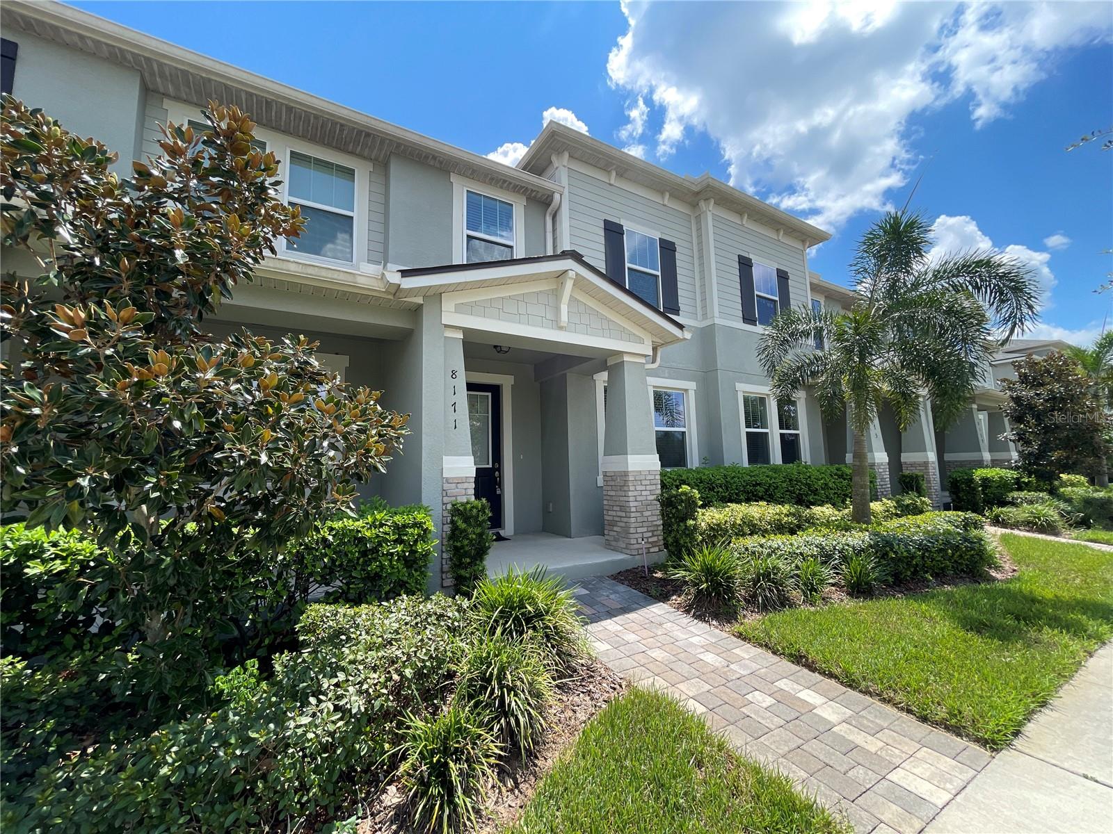 Welcome to 8171 Graycliff Avenue, a charming townhouse nestled in the heart of Winter Garden, FL. This delightful home boasts three spacious bedrooms, two full baths, one half bath and an additional flex room, perfect for a home office or den, ensuring plenty of space for all your needs.
The property's open floor plan is a dream come true for those who love a sense of flow and connection between spaces. The main living area is graced with custom porcelain tile, adding a touch of elegance and easy maintenance. Step outside to a private open-air courtyard, a serene spot that seamlessly connects the garage with the main home, perfect for enjoying Florida's beautiful weather.
Upstairs, you'll find the convenience of a laundry room, eliminating the need to carry laundry up and down the stairs. The property also features a spacious two-car garage, providing ample storage and parking space.
The location of this home is a standout, positioned directly across from a playground and soccer field. Imagine the ease of recreational activities right at your doorstep.
As a resident of this vibrant community, you'll have access to resort-like amenities. Unwind in the community pool, keep fit at the fitness center, or let the little ones have fun at the kids splash pad. The clubhouse, complete with event space, offers a great spot for socializing and entertaining.
For golf enthusiasts, the Orange County National Golf Course is just a few minutes away. And when you're in the mood for shopping or a bite to eat, downtown Hamlin's restaurants and shops are conveniently close.
One of the unique features of this community is the beautiful views of the Disney fireworks, which can be seen nightly, adding a touch of magic to every evening. Plus, the community is golf cart friendly, making local trips a breeze.
8171 Graycliff Avenue is more than just a home; it's a lifestyle. Come and experience the magic for yourself.