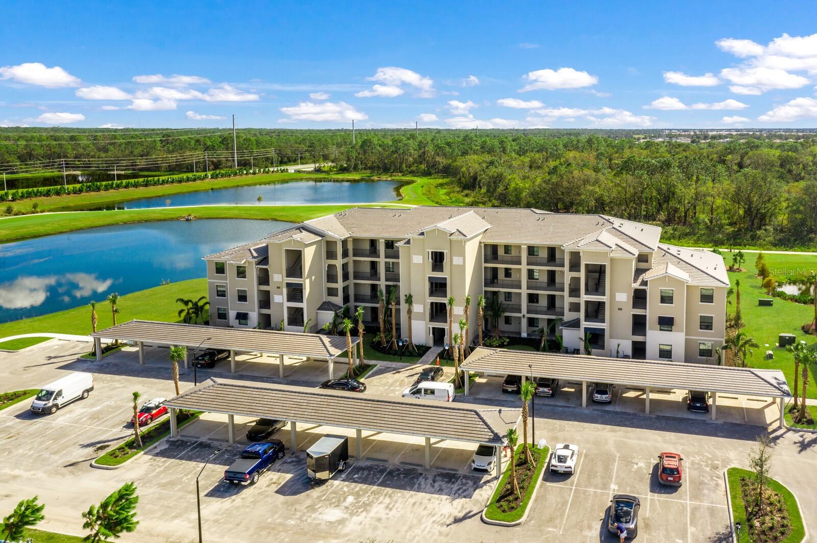 AVAILABLE JAN/FEB & APRIL 2026 AND ALL OFF SEASON MONTHS 2025. WELCOME TO THE AMAZING LAKEWOOD NATIONAL GOLF CLUB! Comes with Golf Membership Transfer. Spectacular 3BR/2BA "Carolina Model" upper-floor (i.e., there is no one living above you!), high-ceiling, corner end-unit condominium (only two of its kind in each building!), which is the largest (approx. 1,500 gross sq. ft.) and most desirable condominium in the "Terrace Condominiums" at Lakewood National. Upon entering the condominium, you immediately appreciate the ten-foot ceilings and the open-concept floorplan of the full kitchen, dining room, and living room with southern exposure. The kitchen features all stainless-steel appliances and a large center island where you can create and enjoy your favorite culinary delights! Situated on the third floor with no one living above you, the living room, the primary suite, and the adjoining lanai are bathed in sunlight all day and reveal a breathtaking panoramic premium view of three tranquil lakes surrounding the 14th and 15th holes of the Piper Golf Course. The condominium has its own washer and dryer, and the rental also includes one reserved space under the building's covered parking structure. Amenities include a Grand Clubhouse with restaurant and bar, state of the art fitness center, resort style beach entry lagoon swimming pool with outdoor grille tiki bar and poolside cafe/service, a full-service spa, tennis courts, bocce ball and more! Golf/Membership transfer available, expenditure is required at the on-site Tiki Bar/Restaurant (Alcohol Excluded), tennis courts, pickleball, and much more! The Club has full-time, on-site trainers and professionals for golf, fitness, and racquet sports to help you reach your sports and fitness goals. Lakewood National is synonymous with luxury and is simply one of the best luxury golf communities in all of Florida! **HOA APPLICATION/TRANSFER FEE $600+tax