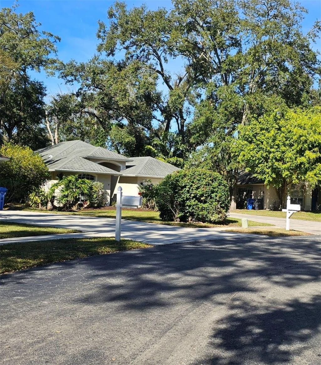 Photo of 4611 Hidden Shadow Drive, Tampa, FL 33614 (MLS # TB8463810)