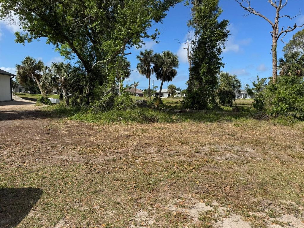 Photo of 50 Pine Valley Lane, Rotonda West, FL 33947 (MLS # D6141662)