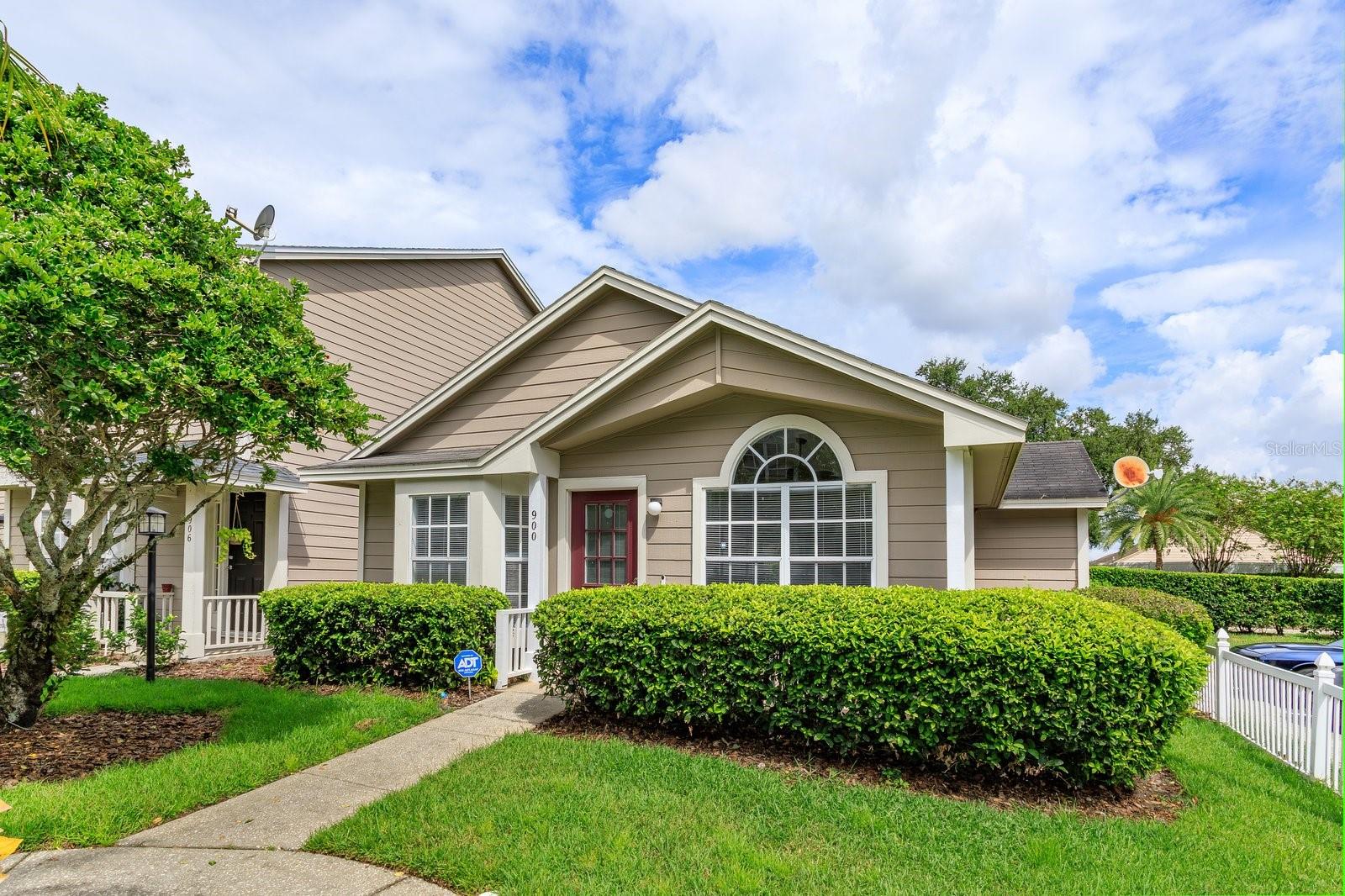 Step inside this charming villa-style condo perfectly situated just minutes from UCF, offering a
blend of comfort, convenience, and low-maintenance living. The open layout creates a seamless flow
between the spacious living and dining areas, with natural light pouring through large windows and
glass doors that open to a private patio, ideal for morning coffee or evening relaxation. The
kitchen is thoughtfully designed with ample cabinet space and a breakfast bar that makes
entertaining easy. Each of the two bedrooms is generously sized, with the primary suite featuring
its own en-suite bath and walk-in closet for added privacy. The second bedroom and full bath
provide the perfect setup for roommates, guests, or a home office. Tucked in a quiet community
setting, this home combines the feel of single-family living with the benefits of condo ownership,
including access to beautifully maintained grounds and amenities. With its unbeatable location near
campus, Research Park, shopping, dining, and major roadways, this residence makes an excellent
choice for professionals or investors looking for strong rental potential.