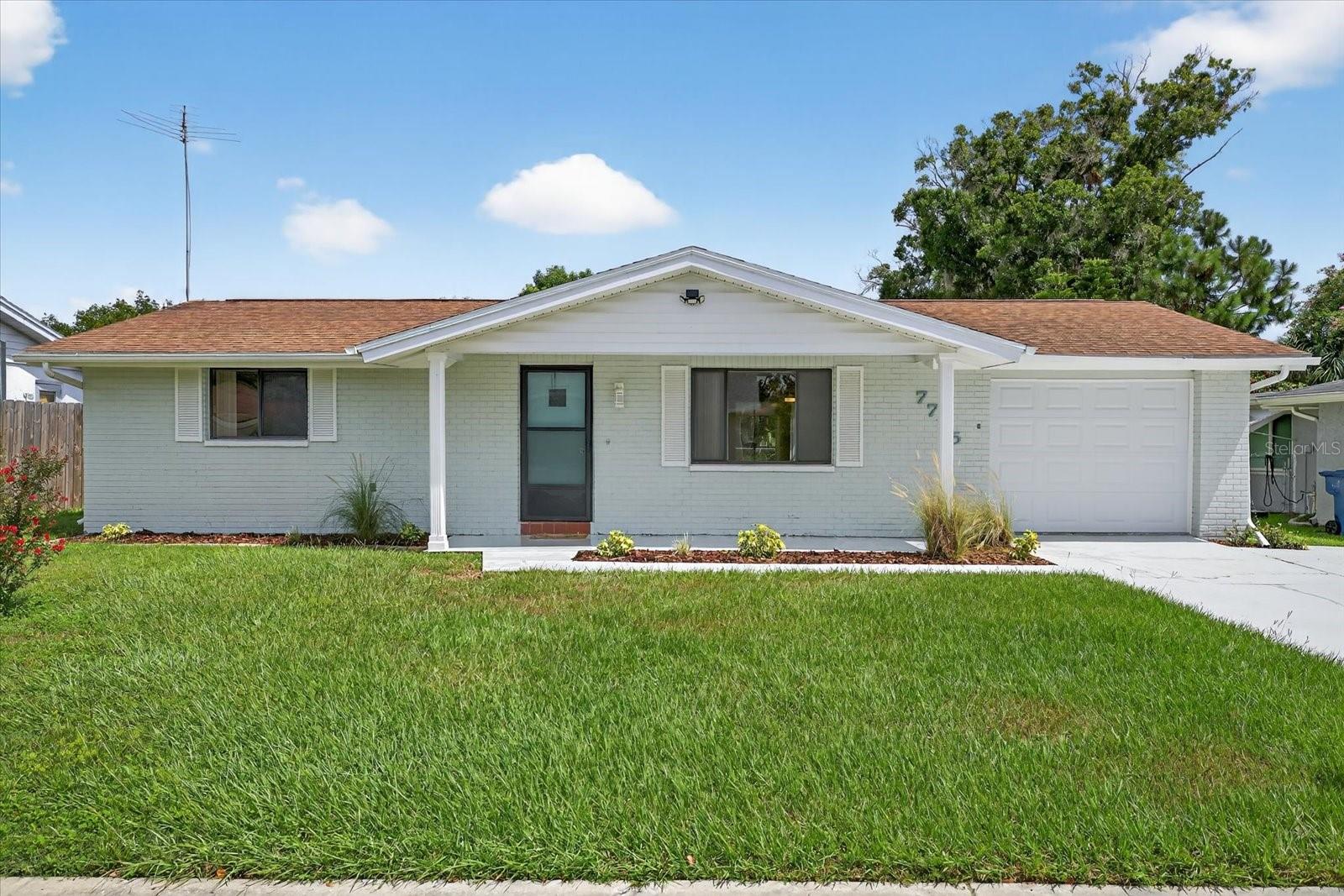 Clean, Well-Maintained Home with Spacious Yard and Florida Room! This bright and inviting 2 bedroom, 2 bathroom home has been lovingly cared for and is move-in ready. From the moment you arrive, you’ll notice the fresh, clean exterior with updated paint, welcoming front porch, and charming curb appeal. Inside, the home features a spotless interior with neutral finishes that make it easy to move in and make your own. The kitchen and living spaces are open and functional, perfect for everyday living. One of the standout features of this home is the enclosed Florida room, ideal for enjoying year-round comfort while overlooking the large, fully fenced backyard. The yard provides plenty of room for outdoor activities, gardening, or simply relaxing in your private space.