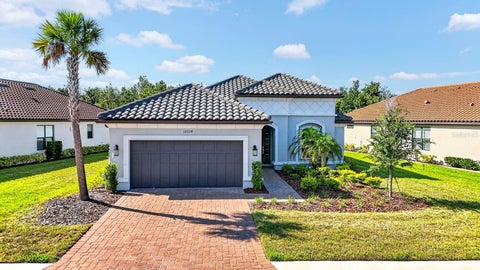 Photo of 10924 Wicker Park Place, Palmetto, FL 34221 (MLS # A4698103)