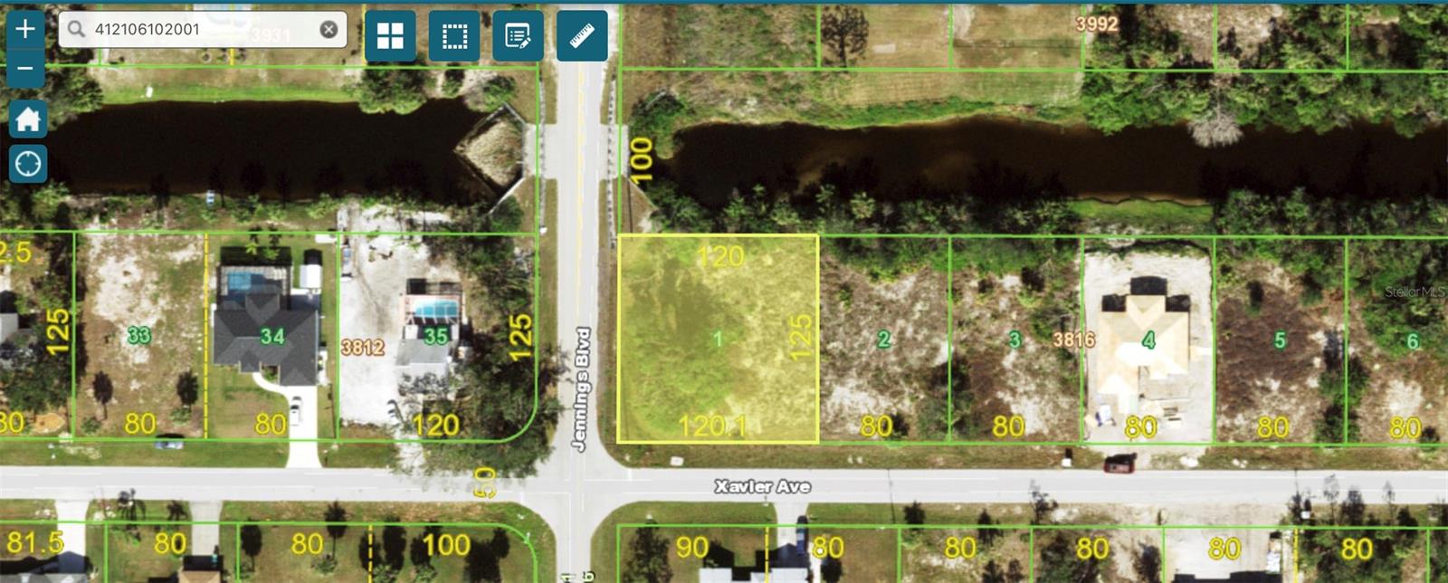 Build your DREAM HOME right here on this spacious corner lot, with canal access and a view! Located close to US41, where you have access to all of the local shops, restaurants, and boat docks for a day out in the gulf!