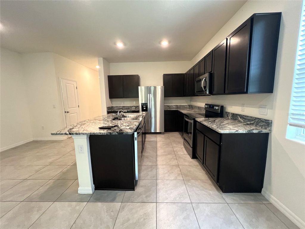 Photo of 32817 Pez Landing Lane, Wesley Chapel, FL 33543 (MLS # TB8429811)