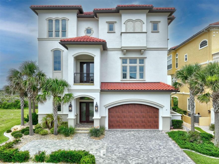 SEASIDE PARADISE. Sophistication meets coastal living in the luxorious gated community of Hammock Beach Golf Resort and Spa. This magnificent oceanfront residence offers over 5000 square feet of opulent living space, meticulously designed to elevate your lifestyle. With a perfect blend of modern amenities, and breathtaking views of the Atlantic Ocean, this three-story home exceeds every expectation. Travertine, luxury vinyl, and marble floors gracefully guide you through the residence. Exquisite craftsmanship and attention to detail showcase a true testament to luxury living. Comfortable elevator effortlessly transports you between the three levels, ensuring convenience and accessibility for all. Vibrant hues of sunrise from your private balcony. Unwind as the sun dips below the horizon from your exclusive sunset balcony. Embrace the art of relaxation and entertainment with a saltwater pool featuring a swim jet, where you can enjoy invigorating swims or simply bask in the sun's warm embrace. Stroll leisurely along your private beach walkover, immersing yourself in the tranquility of The Atlantic Ocean. This luxury home boasts a whole-house air purification system and water filtration, ensuring the highest quality of air and water for you and your loved ones. The Control 4 audiovisual system brings a symphony of entertainment to every corner of the residence. The gourmet kitchen, adorned with top-of-the-line Thermidor stainless steel appliances, beckons culinary excellence.  Entertain in casual elegance, create unforgettable family memories, and enjoy the vibrant coastal lifestyle that awaits you. Don't miss this exceptional opportunity to call this oceanfront oasis your own. Want extra space? The lot next door is also for sale!! Contact us today to experience the pinnacle of luxury living in the sought-after Hammock Beach Golf Resort and Spa community.