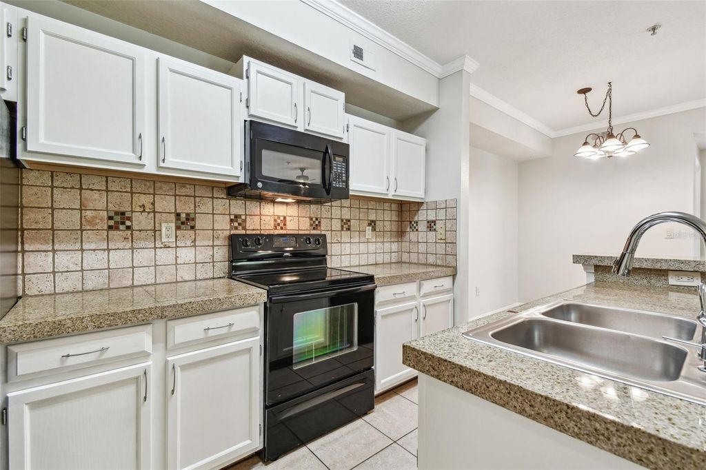 Photo of 5608 Pinnacle Heights Circle #305, Tampa, FL 33624 (MLS # TB8307017)