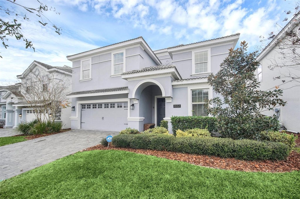 Photo of 1652 Moon Valley Drive, Davenport, FL 33896 (MLS # O6438766)