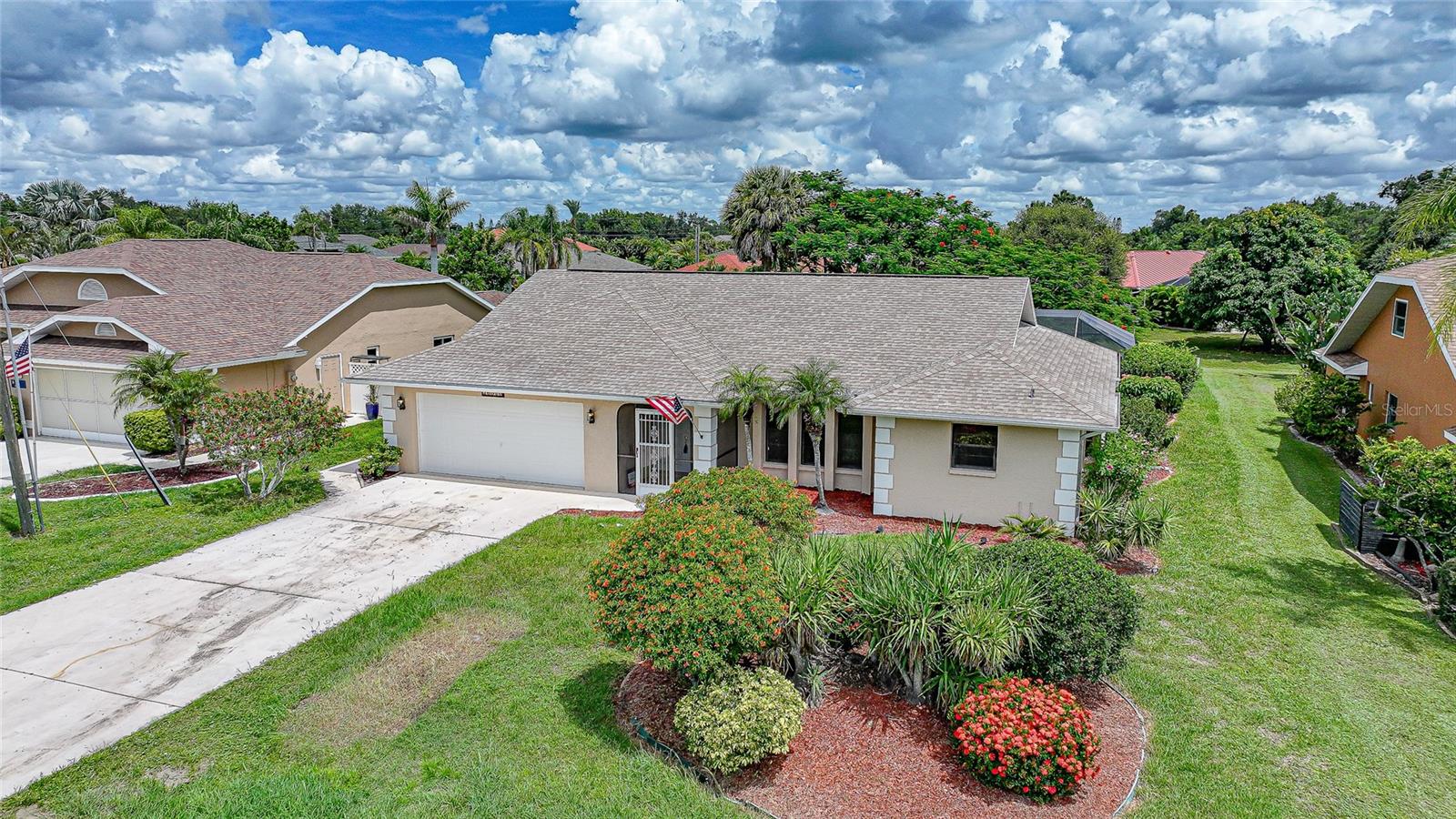 Welcome to your dream home in the highly sought-after community of Deep Creek! This gorgeous 3-bedroom, 2-bathroom residence boasts 1,838 sq ft of well-designed living space and offers the perfect blend of comfort, style, and Florida charm. From the moment you step inside, you’ll be captivated by the tile flooring throughout, offering a clean, cohesive look that’s as practical as it is elegant. The spacious, open floor plan is ideal for entertaining and everyday living, featuring generous room sizes and an abundance of natural light. The heart of the home is the bright and airy living area that flows seamlessly into the dining space and kitchen — perfect for hosting family and friends. The kitchen offers plenty of cabinet and counter space for all your culinary needs. Retreat to the large primary suite, complete with an en-suite bath and ample closet space. The two additional bedrooms are well-sized and versatile, ideal for guests, a home office, or a growing family. The second full bathroom conveniently doubles as a pool bath, making outdoor entertaining a breeze! Step outside to your own private oasis: a sparkling screened-in pool surrounded by a spacious lanai, perfect for relaxing or enjoying warm Florida evenings. With deed restrictions in place, the Deep Creek community maintains a beautifully kept neighborhood with pride of ownership throughout. Don’t miss your chance to own this stunning, move-in ready home in one of Punta Gorda's most desirable neighborhoods. Schedule your private showing today — this one won’t last long!