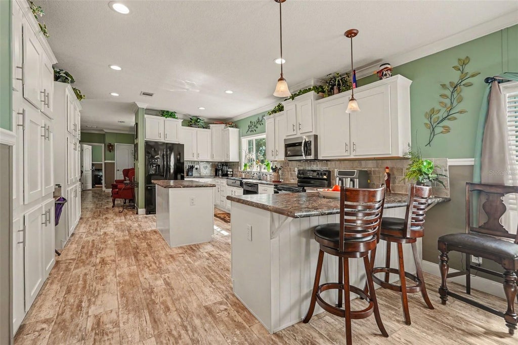 Photo of 4943 E Stage Coach Trail, Floral City, FL 34436 (MLS # TB8554272)