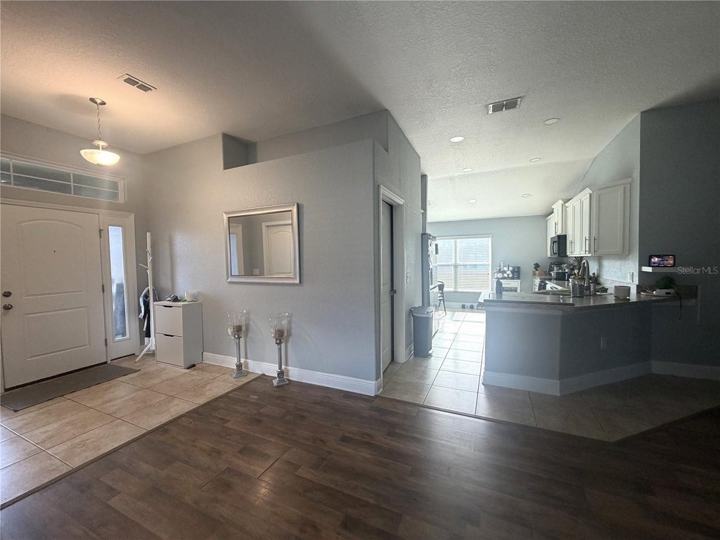 Photo of 1358 Buckeye Trace Boulevard, Winter Haven, FL 33881 (MLS # L4965836)
