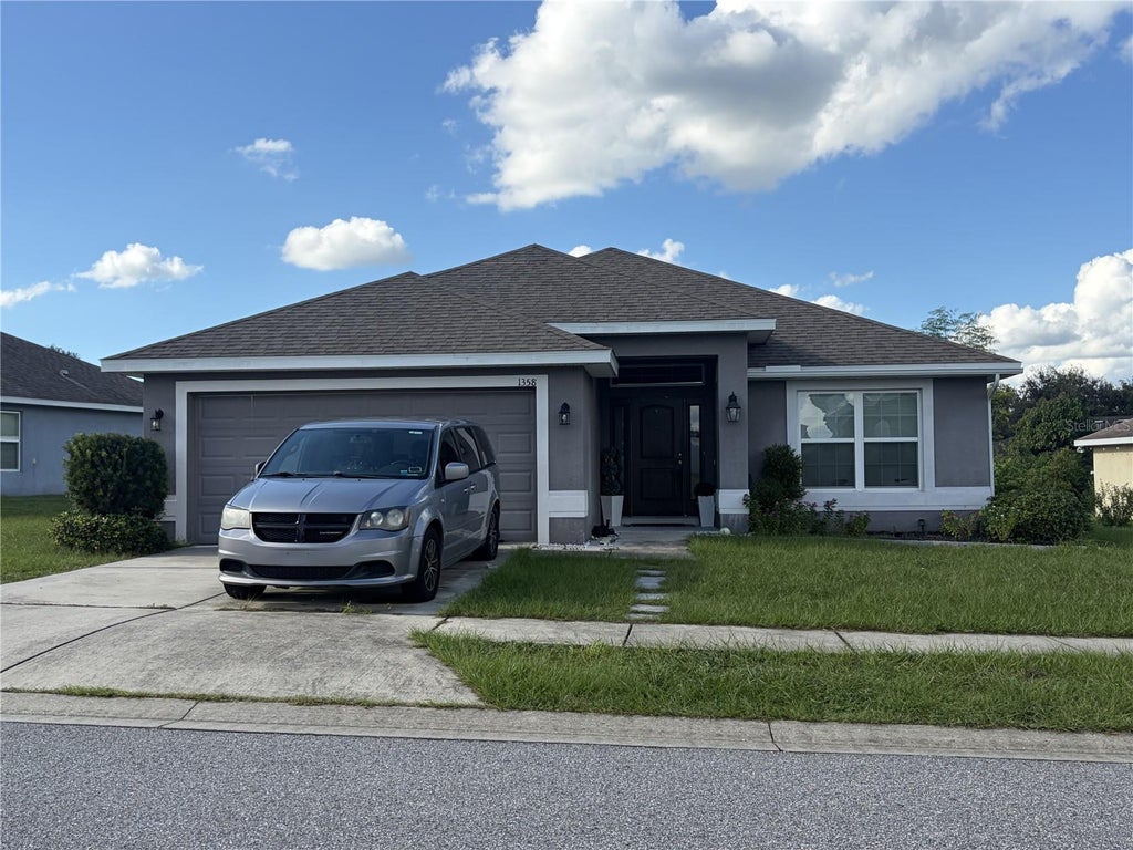 Photo of 1358 Buckeye Trace Boulevard, Winter Haven, FL 33881 (MLS # L4965836)