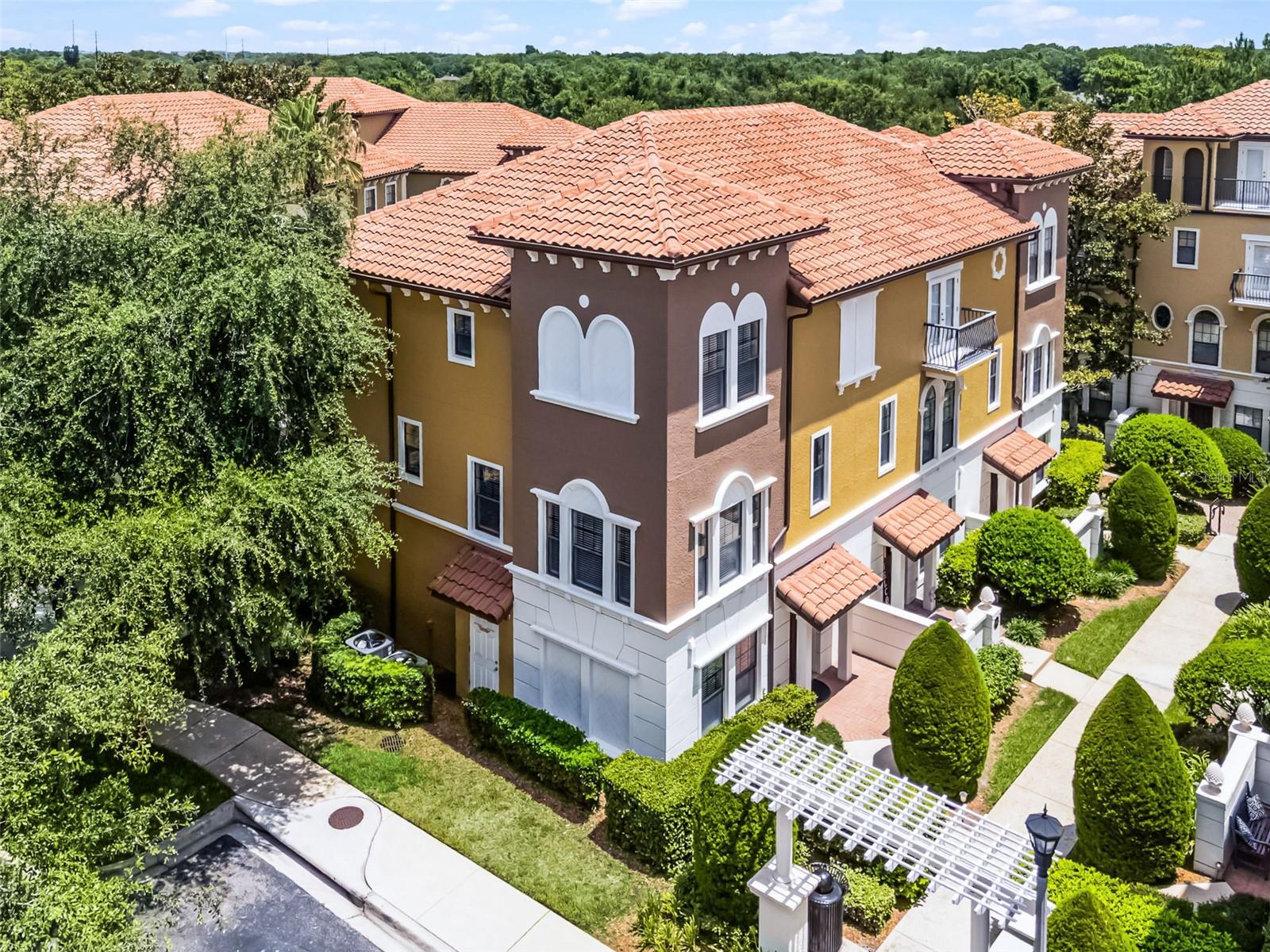 Welcome to Fountain Parke at Lake Mary, where Tuscan charm meets modern convenience! This stunning 3-story corner unit townhome offers 4 spacious bedrooms, 3.5 baths, and its own private elevator for effortless access to every level. Nestled in a guard-gated, resort-style community, this home is designed for comfort, elegance, and ease.
The first floor features a guest suite with full bath and access to the attached 2-car garage. Upstairs, the main living space boasts an open-concept layout perfect for entertaining, with a bright and airy living/dining combo and a chef-inspired kitchen complete with granite countertops, stainless steel appliances, tile backsplash, breakfast bar, and cozy eat-in nook.
Retreat to the third floor where you’ll find three additional bedrooms, including the primary suite with a walk-in closet, dual vanities, a makeup station, soaking tub, and separate shower. Notable upgrades include crown molding, intercom system, and custom finishes throughout.
Enjoy resort-style living with amenities including a clubhouse, fitness center, tennis courts, playground, dog park, and a resort-style pool. Ideally located near premier shopping, dining, I-4, and the Cross Seminole Trail—plus just minutes from vibrant Downtown Lake Mary and the Lake Mary Sports Complex.
Don’t miss your chance to own in one of Central Florida’s most sought-after townhome communities!
