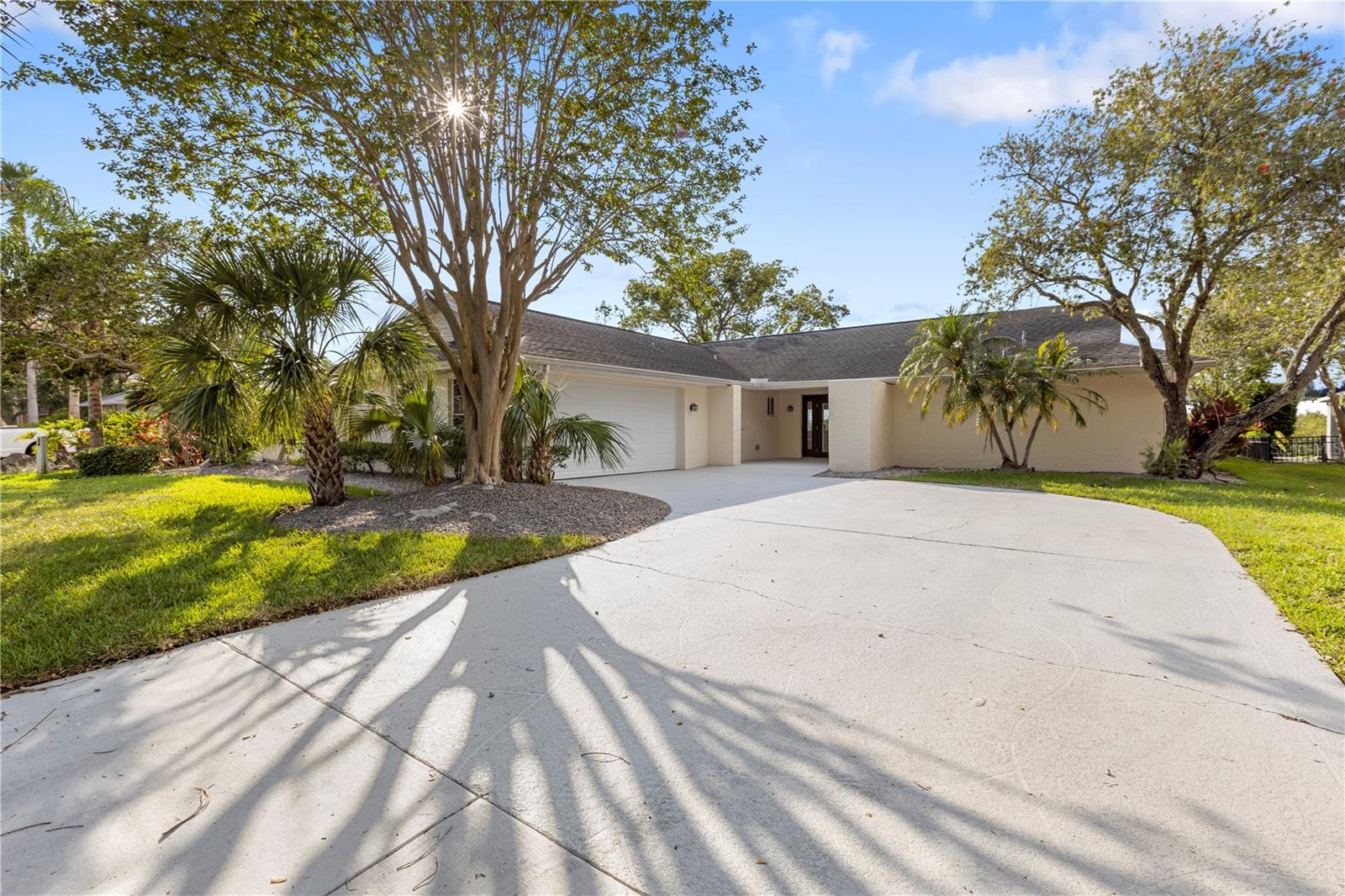 Waterfront Elegance and Coastal Living in New Port Richey.
Welcome to a serene waterfront escape where modern luxury meets laid-back coastal charm. This beautifully updated 3-bedroom, 2-bathroom home offers 2,086 sq ft of refined living space with tranquil water views and direct Gulf access—all just minutes from downtown New Port Richey.
Step inside to discover a bright, open layout with ceramic tile flooring throughout and carefully curated custom finishes. The gourmet kitchen is a standout, featuring Roma Gold quartz countertops, custom white oak cabinetry, stainless steel appliances, and captivating water views that carry through to the living room and primary suite.
The spacious primary bedroom offers a peaceful retreat with private water views and direct access to the lanai. Two additional bedrooms provide flexibility for family, guests, or a home office. Both bathrooms feature elegant custom tilework, adding a touch of luxury to everyday living.
Step outside and embrace the Florida lifestyle with a screened-in lanai, pool and jacuzzi, and a 2025 refurbished boat lift with new controller—all situated on a deep canal with quick access to the Gulf. Whether you’re enjoying a sunset cruise, a poolside gathering, or a quiet morning coffee, this backyard is designed for relaxation and recreation.
Extensive upgrades completed in 2025 include:
Elevated AC condenser, New electrical panel, New water heater, New pool pump, New garage motor, track, and door, Fresh interior and exterior paint, Updated landscaping
Set in a prime location just minutes from downtown New Port Richey’s shops, dining, and cultural venues, as well as Green Key Beach, Eagle Point Park, and the Suncoast Trail.
This is more than a home—it’s a coastal lifestyle redefined. Schedule your private tour today and discover waterfront living at its finest.