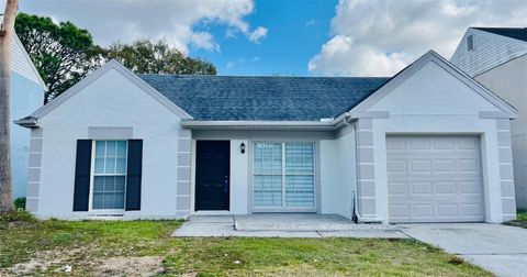 Photo of 11009 Summer Drive, Tampa, FL 33624 (MLS # TB8478565)