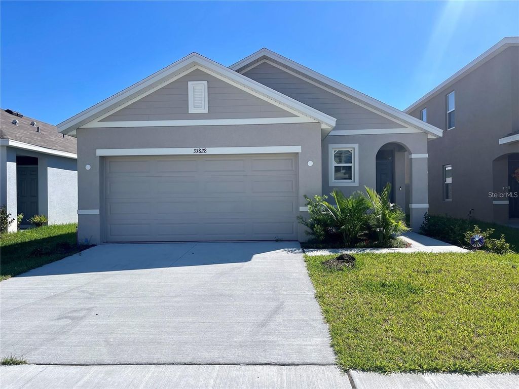 Photo of 33828 Jasmine Star Loop, Wesley Chapel, FL 33543 (MLS # TB8465021)