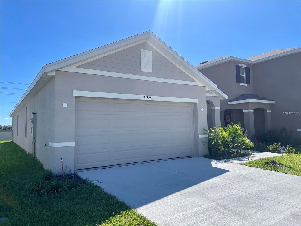 Photo of 33828 Jasmine Star Loop, Wesley Chapel, FL 33543 (MLS # TB8465021)