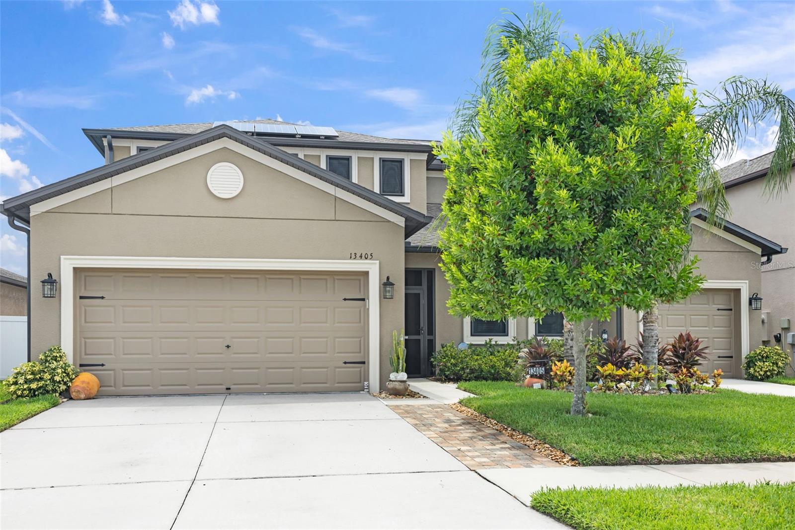 Experience elevated Florida living in this exquisitely designed 6-bedroom, 4.5-bathroom pool home with a 3-car garage and 3,912 sq ft of luxurious living space.
This thoughtfully crafted multigenerational layout offers flexibility, privacy, and sophistication—perfect for today’s evolving household needs. The attached multi-gen suite features its own private entrance, 1-car garage, a spacious bedroom, full bathroom, kitchenette, and stackable washer and dryer—a rare and valuable setup.
Outdoors, the backyard is an entertainer’s dream, complete with a luxury pool, fully fenced yard, and an electric retractable awning for shaded relaxation. The home is also hurricane-ready, equipped with permanent hurricane shutters throughout—including a roll-down shutter on the sliding glass door for added protection.
Buyers will appreciate the whole-house surge protection, wiring for a whole-house generator, Level 2 EV charger, and a fully transferable solar system, offering long-term energy efficiency and cost savings.
All of this comes with the added benefit of a low HOA in a prime location near shopping, dining, and commuter routes. This home seamlessly blends luxury, innovation, and peace of mind—a rare opportunity in one of the area’s most desirable communities.
Schedule your private tour today and step into your future home.