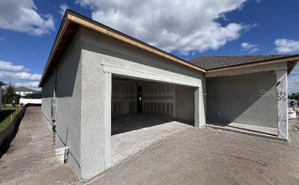 Photo of 5755 Cattle Ranch Dr, Saint Cloud, FL 34771 (MLS # TB8447979)