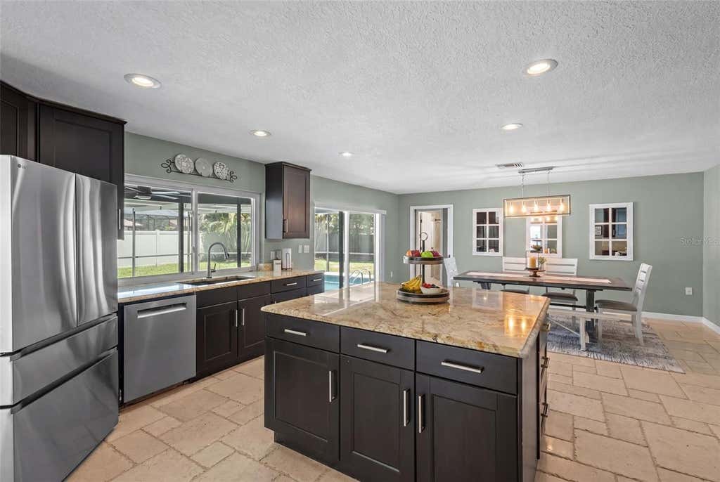 Photo of 3046 Oak Cove Drive, Clearwater, FL 33759 (MLS # TB8517326)