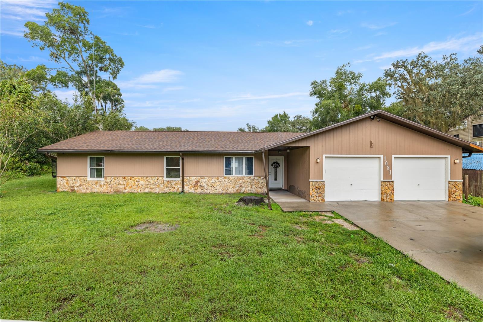 Survey already complete—one less thing to worry about! This spotless 4-bedroom home (plus a flexible bonus room) with 2.5 baths and a 2-car garage sits on nearly half an acre in the Silver Springs community, just minutes from town. It’s also a straight shot to the coast via the scenic Black Bear Byway—perfect for weekend escapes. Major updates are already done: brand-new roof (2023), HVAC (2024), water heater (2023), updated tile flooring (2024), granite countertops, fresh interior paint, and no carpet anywhere. Trees have also been cleared for added space and peace of mind. Move-in ready and waiting for you!
