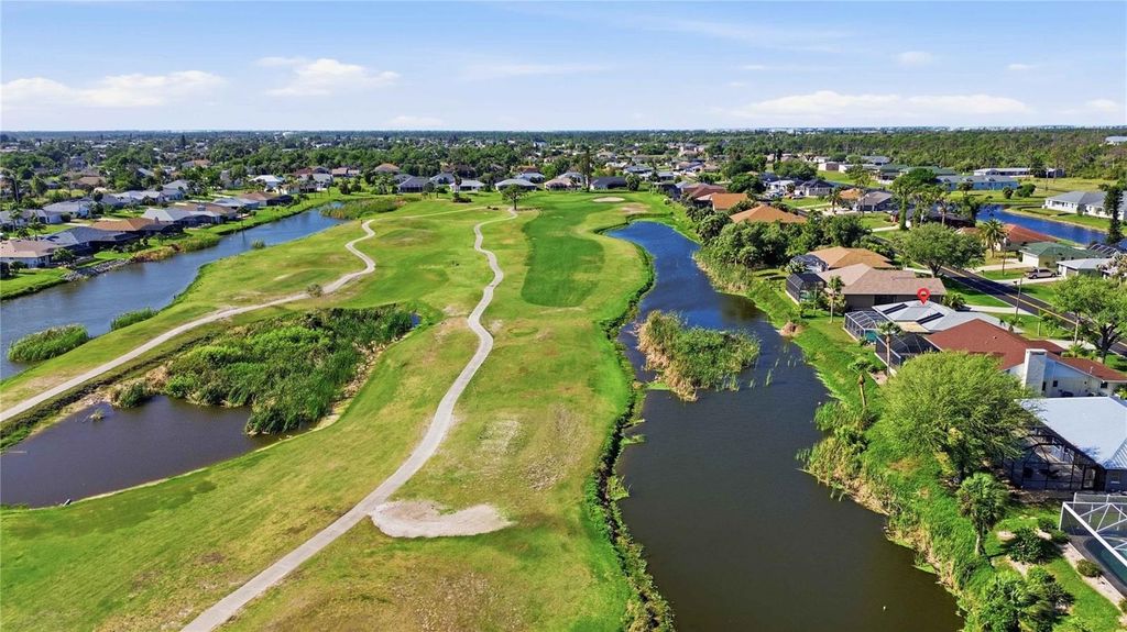 Photo of 244 Rotonda Circle, Rotonda West, FL 33947 (MLS # D6147037)