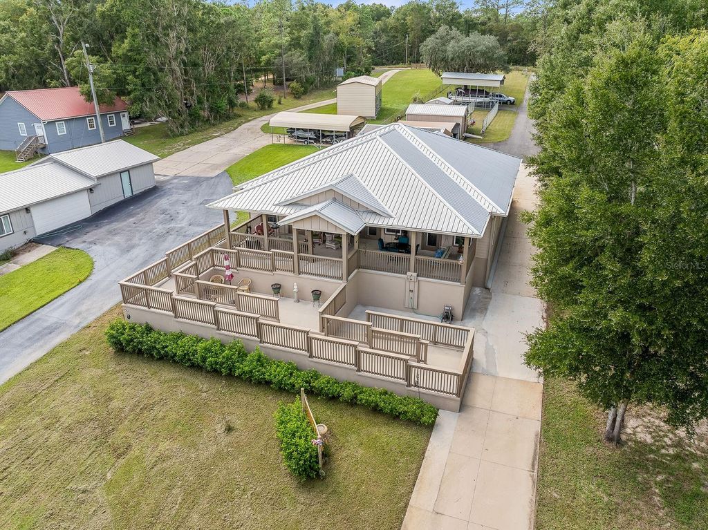 Photo of 8449 Lilly Lake Road, Melrose, FL 32666 (MLS # GC534309)
