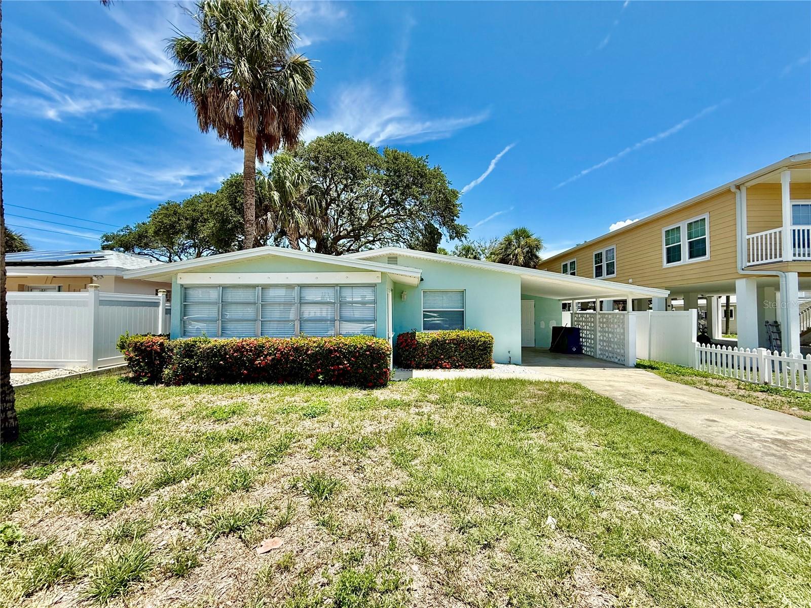 Welcome to your coastal retreat just across the street from public access to the sugar-white sands of Indian Rocks Beach! This light and bright 2-bedroom, 1.5-bath home offers the perfect blend of comfort and beachside living. Step inside to an open and airy floorplan featuring stylish wood laminate flooring and durable terrazzo throughout. The chef’s kitchen is a dream with sleek stainless steel appliances, eye-catching tile backsplash, and gorgeous granite countertops—ideal for preparing fresh coastal meals. Ceiling fans are thoughtfully placed throughout the home, keeping things cool and breezy year-round. A convenient half bath is located in the laundry room just off the carport, perfect for rinsing off after a beach day. Out back, you'll find a large, fully fenced yard with a concrete slab and picnic table—ideal for weekend BBQs, outdoor dining, or simply relaxing in the sun. An outdoor shower makes it easy to rinse off the sand before heading indoors.
Enjoy a prime location close to fantastic local restaurants, shopping, and entertainment. Whether you're looking for a full-time residence, vacation home, or investment property—this beachside gem is the perfect place to soak up the Florida lifestyle! In addition to the advertised base rent, all residents are enrolled in the Resident Benefits Package (RBP) for $50.00/month which includes HVAC air filter delivery, credit building to help boost your credit score with timely rent payments, utility concierge service making utility connection a breeze during your move-in, and much more! More details upon application. One pet allowed at the owner's discretion, max 35 lbs. Lawn care is included in rent. Washer and dryer are provided for your convenience. Vacant and Available now!