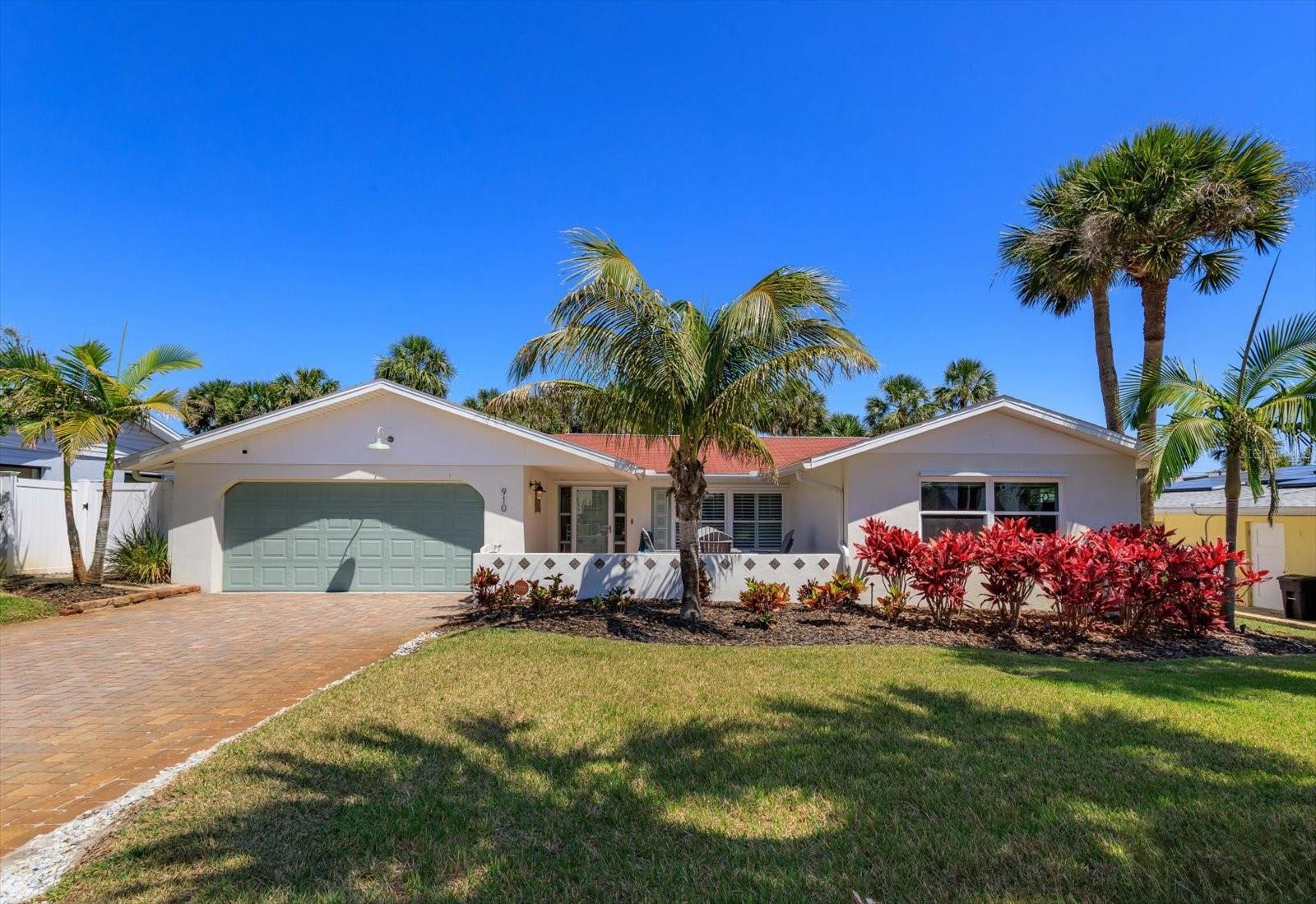 Welcome to your BEACHSIDE BLISS OASIS! This stunning 3 bedroom 2 bathroom, NO HOA, Single family home is located in one of the MOST DESIRABLE areas of NEW SMYRNA BEACH. This IMMACULATE HOME invites you into an UPSCALE COASTAL RETREAT. SPACIOUS SPLIT FLOOR PLAN, with ENGINEERED HARDWOOD flooring throughout, SEPARATE family and living room to truly make this home inviting for everyone. If you’re an ENTERTAINER this home was made for you! KITCHEN boasts with HIGH END CUSTOMIZATIONS thoughtfully throughout with AMPLE COUNTER SPACE, CUSTOM CABINETS- SOFT CLOSE with TREMENDOUS EXTRA STORAGE, CHEFS STYLE KITCHEN, MIELIE APPLIANCES, wine cooler, and ice machine! The PRIMARY BEDROOM is ENHANCED with NATURAL LIGHS, BUILT IN DESK and CUSTOM WALK IN CLOSET. FRENCH DOORS lead you to your PRIVATE BACKYARD RETREAT surrounded by LUSH GREENERY and BAMBOO, accompanied by an in ground SALT WATER POOL, GAZEBO, ample PAVER DECKING, PLUS AN OUTDOOR SHOWER for that after beach sand or post workout rinse off. STEPS AWAY from BEACHSIDE ACCESS along with being surrounded by NSBs FAVORITE STAPLE RESTAURANTS and COASTAL RETAIL. GOLF CART APPROVED for swift travel to your next date night or sunny beach day. The popular FLAGLER AVE is just a few blocks over. The OPTIONS ARE ENDLESS! THIS IS A MUST SEA FOR NSB LIVING! MAKE THIS HOME YOURS TODAY! BEACHSIDE SUMMER IS CALLING YOU HOME!