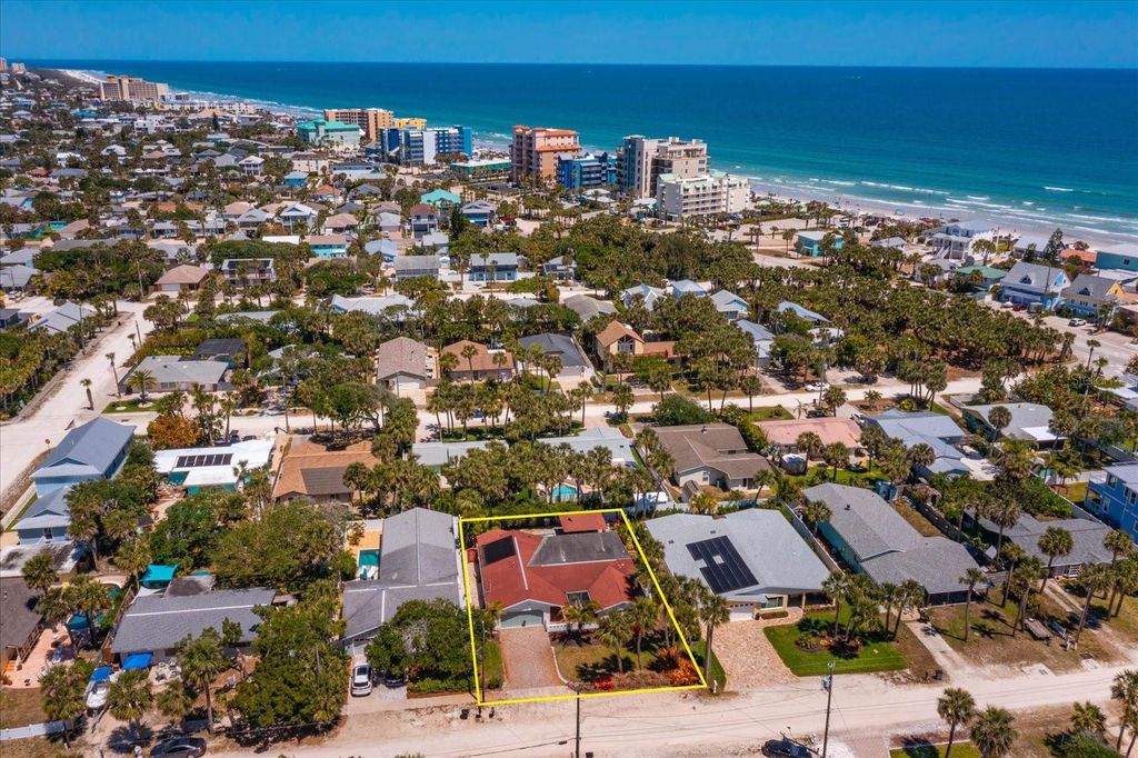 Photo of 910 Locust Street, New Smyrna Beach, FL 32169 (MLS # G5095645)