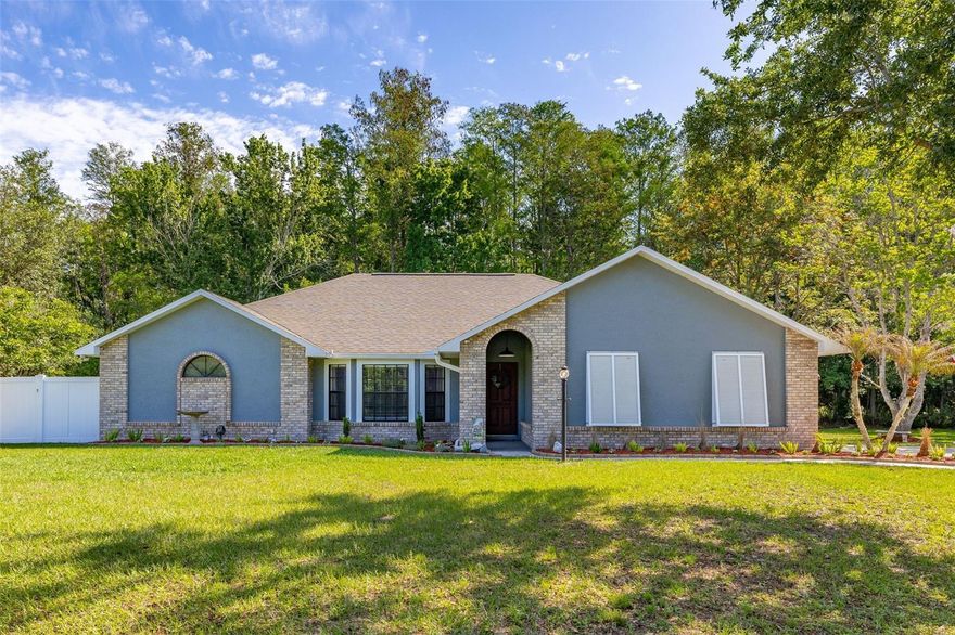 Welcome home to 2.5 acres of private Florida living! This charming 3-bedroom, 2-bathroom block home in Kissimmee offers the rare combination of expansive acreage and ultimate convenience, all with NO HOA. Located just moments from Osceola Heritage Park and offering quick access to major thoroughfares, this property is perfectly situated for easy commuting and entertainment. The original owners have meticulously maintained and updated the residence, ensuring move-in readiness. Significant recent improvements include a NEW ROOF in 2018, a NEW 4 TON HVAC SYSTEM with a Ditek Surge Protector installed in 2022, an exterior repaint in 2025, and a new septic pump and service in early 2026. Additionally, enjoy the freshly rescreened porch and new vinyl privacy fencing.

Step inside to find vaulted ceilings and three skylights illuminating the open living areas, which feature a formal living room with a bay window and a cozy family room complete with a wood-burning fireplace. The primary suite offers a private retreat with a double pocket sliding glass door leading to the lanai, and a spacious bath featuring a double vanity, walk-in shower, and soaker tub. The home features a mix of laminate in the bedrooms and living/dining areas and tile in the kitchen and baths for ease of maintenance. Enjoy the tranquil Florida outdoors from the screened lanai, complete with new fans and a durable Chattanooga Rock floor, which provides scenic views of trees and wilderness on your 2.5-acre lot. The back of the home features an extended paver patio perfect for outdoor entertaining. Additionally, if a pool is in your future plans, the second guest bath includes a convenient door leading directly to the patio.