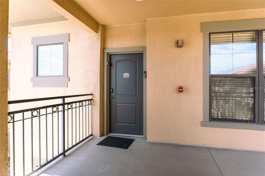 Beautifully furnished Italian-Mediterranean style 2-bedroom, 2-bath condo, fully upgraded with 16" tile in the main living areas, carpet in the bedrooms, granite countertops in both kitchen and bathrooms, cherry wood cabinetry, and crown molding throughout. Each bedroom has its own private full bathroom for maximum comfort and convenience.

This top-floor unit features a covered balcony with relaxing south-facing pool views. Bella Piazza is zoned for both residential and short-term rental use, making it an excellent investment opportunity, second home, or permanent residence.

Resort-style amenities include two community pools, a kiddie pool with water playground, fitness center, business center, game room, BBQ area, and on-site management. Conveniently located just steps from dining, groceries, and shopping at Berry Town Center, and only 10 minutes from Disney.

Move-in ready—ideal as a vacation getaway, short-term rental, or your new home in the sunshine.