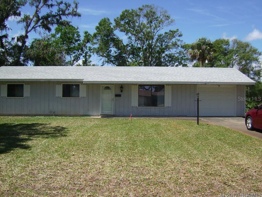 THIS 3 BEDROOM, 2 BATH HOME IS WAITING FOR A NEW OWNER.  IT HAS A ONE CAR GARAGE AND A NEW ROOF.  OPEN FLOOR PLAN, TILE FLOORING.  PORCH OFF DINING ROOM.  EASY ACCESS TO I95, SHOPPING, SHORT DISTANCE TO RIVER AND 15 MIN. TO BEACH.  THE LOT NEXT DOOR IS AVAILABLE AS WELL (PRICE IS $23900).  DON'T MISS THIS ONE....STARTER, RETIREMENT OR INVESTMENT RENTAL PROPERTY!! ;Water: City