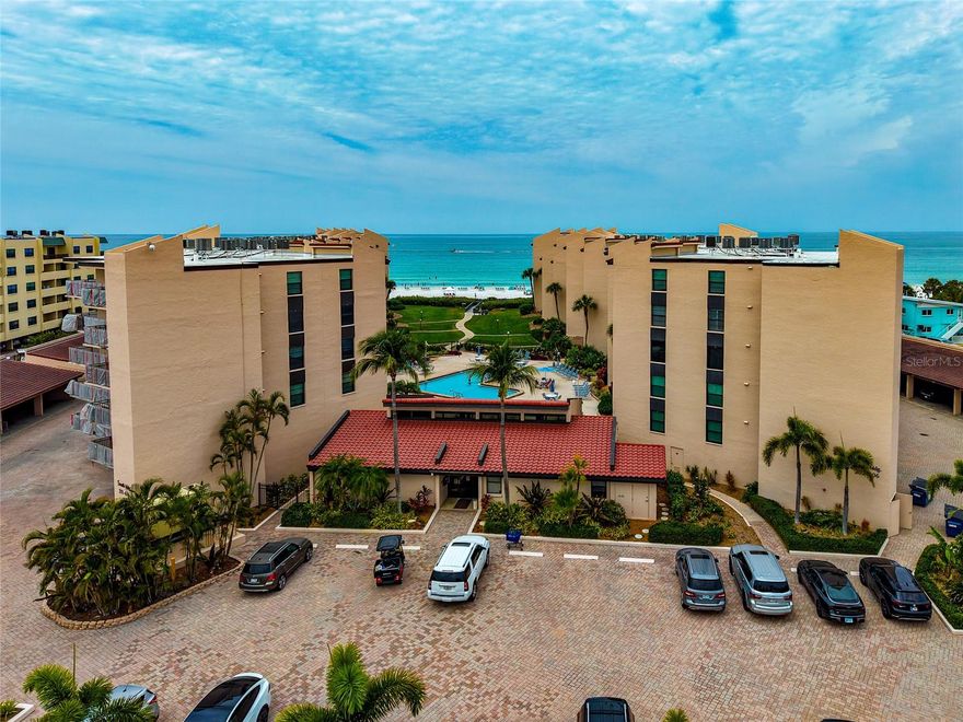 Turnkey-furnished and move-in ready, experience the ultimate coastal lifestyle in this beautifully maintained beachfront condo located on the beautiful, world-famous Siesta Key. Enjoy the soft, white sand of Crescent beach, with a Beach Attendant managing a 200 ft section of private beach. Whether you’re searching for a full-time residence, seasonal getaway, or income-producing investment property, this luxury condo offers the perfect blend of comfort, convenience, and breathtaking Gulf views. Enjoy relaxing mornings and stunning sunsets from your private screened balcony overlooking the sparkling heated pool, tropical courtyard, and turquoise waters of the Gulf of Mexico. Inside, the condo features an open and airy floor plan filled with natural light, tile flooring throughout the main living areas, and tasteful coastal finishes. The kitchen offers ample cabinetry, stainless steel appliances, recessed lighting, tray ceiling detail, and space for entertaining guests with a breakfast bar & dining area. The spacious primary suite provides a peaceful retreat with pool view, plantation shutters and sliding doors that open to the balcony. The ensuite has been updated with dual granite vanities, large walk-in shower and abundant storage. Open the sliders to the balcony for a seamless indoor-outdoor living experience. Residents and guests enjoy resort-style amenities including a beachfront heated pool, direct private beach access with free beach lounge chairs, option to rent an umbrella or cabana, beautifully maintained grounds, covered parking, grills and lighted tennis / pickleball courts. This condo also offers excellent rental potential, making it a fantastic opportunity for investors seeking vacation rental income in one of Florida’s most desirable beach destinations. Ideally located, walk to restaurants, bars, grocery, boat/bike/kayak/jet ski rentals, gift shops and more! Wake up to the beautiful beach & ocean views, where every day feels like a vacation!