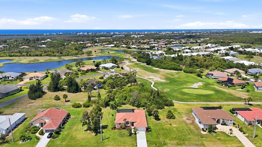 Sun, privacy and spacious elegance in a Cape Haze Villa!  A stunning residence with lush landscaping, a tropical pool setting, privacy, rustic trees, and a partial view of the 18th hole create the ambiance of resort living in your own backyard. In the elegant and upscale neighborhood of Cape Haze Windward with meandering charming streets lined with beautiful homes, surrounded by golf course vistas and expansive Coral Creek waterway. Less than two miles from the Intracoastal Waterway and Gulf waters. Very close to shopping, beaches, fishing and the beautiful Boca Grande causeway. This home is a much more recent build than many in the neighborhood. An aura of eloquence, elegance and style pervade the brilliant, exceptionally open floor plan. Right from the front door enjoy welcoming views of the outdoor living and tropical scenery. Spacious living and family rooms with a large kitchen that opens up to both, this home includes several sets of sliding glass doors that take you to its new patio deck and inviting heated pool. The large master bedroom includes two separate walk-in closets, full ensuite and French doors entry to relax in the screen-enclosed pool area. Live in the tropics with beauty and charm, and peace of mind of a solidly built home. Around the corner from old Florida's best kept secrets - it's tropical and wildlife parks. Generous upgrades and improvements have been made to the home over the last few years that include a premium flat concrete tile roof, many new impact resistant windows and front doors, new insulated garage door, new appliances, recently installed pool patio pavers, pool cage, and pool heater. All furniture and furnishings may be included for additional consideration. Priced very reasonably, this property may not last long for sale.