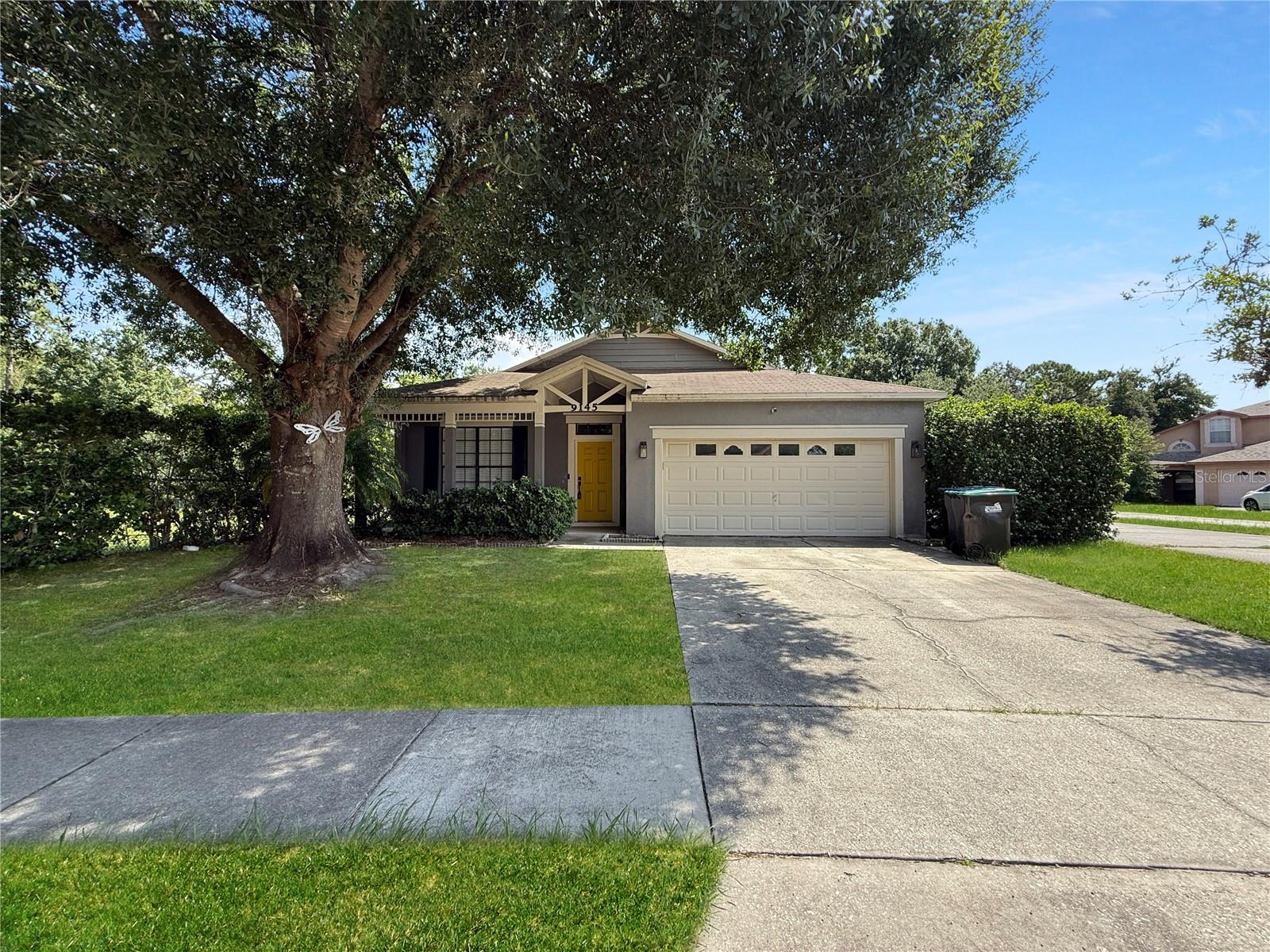 This well maintained 3 bedroom 2 bath home sits on over a half acre lot with no HOA. The home features wood floors throughout, a fully renovated kitchen with cabinets featuring crown molding, stainless steel appliances and granite counters. The oversized island opens to the family room. Upgraded bathrooms, screened porch and a huge backyard! Excellent location close to UCF and zoned for Winter Park High School.