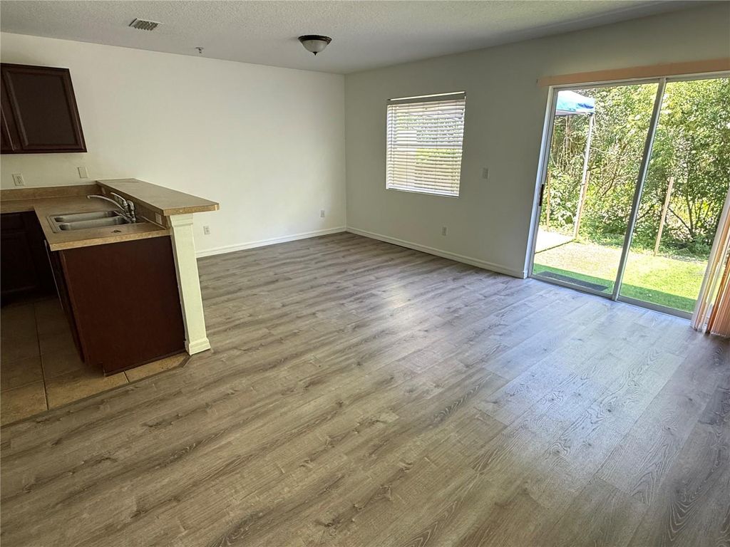 Photo of 13495 Applerose Lane #26, Orlando, FL 32824 (MLS # O6406649)